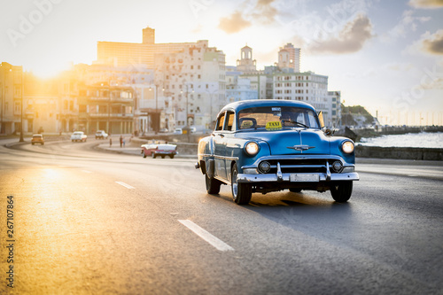 Blue car in Cuba s sunset