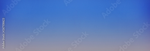 Dark stormy blue sky gradient background 