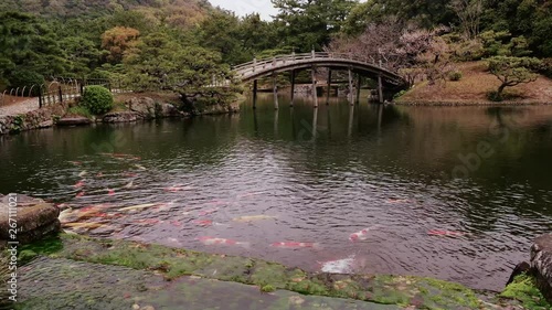 Japanese garden pond and bridge Ritsurin park at kagawa pref Japan. photo