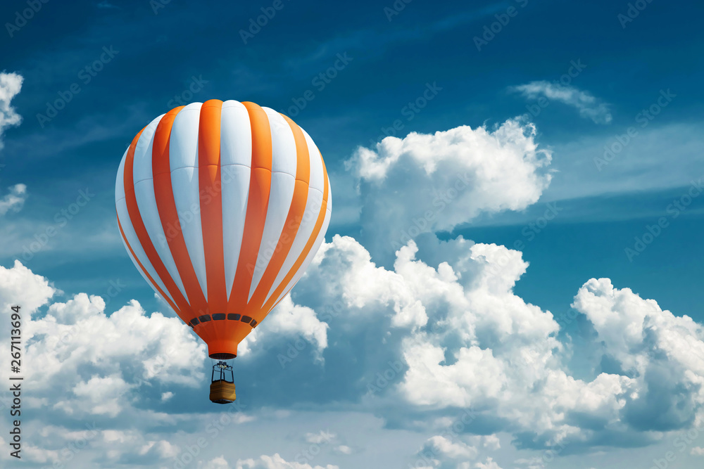 Fototapeta premium Multicolored, large balloons against the blue sky. Travel concept, dream, new emotions, travel agency.