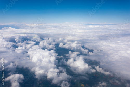 Earth in the airplane window with clouds © LALSSTOCK