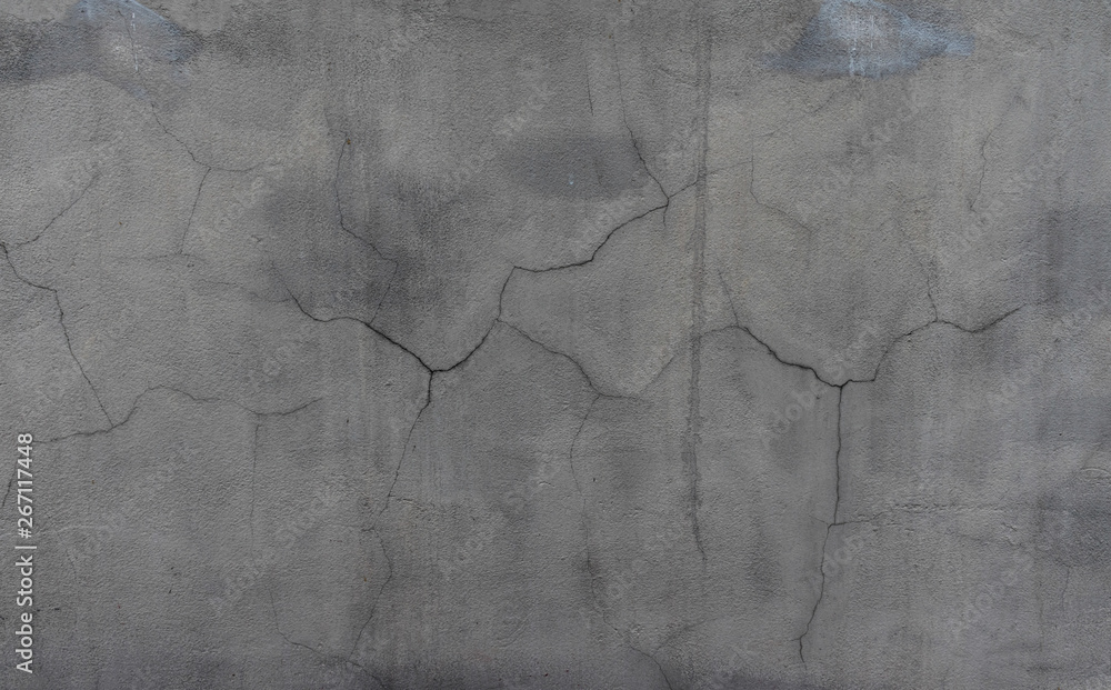 Naklejka premium cement wall cracked hiatus texture background