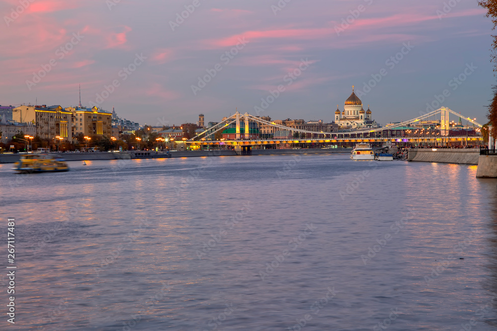 Moskva River and Krymsky or Crimean Bridge (at night)-- is a steel suspension bridge in Moscow, Russia. The bridge spans the Moskva River 1800 metres south-west from the Kremlin