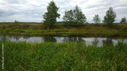 a small river along the field