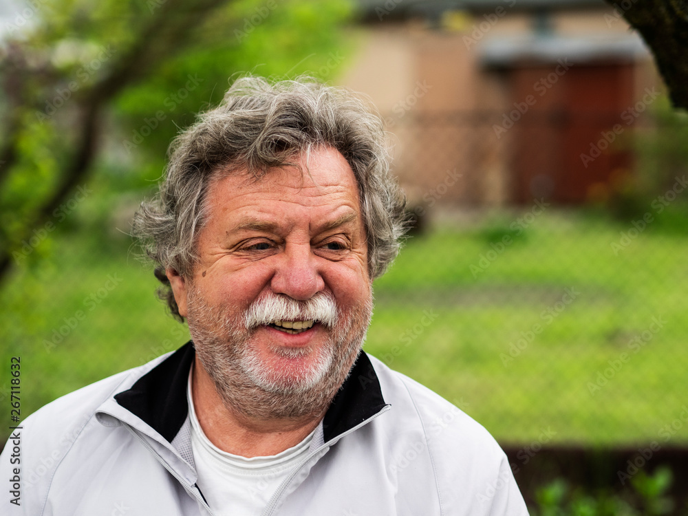 Caucasian man with gray hair