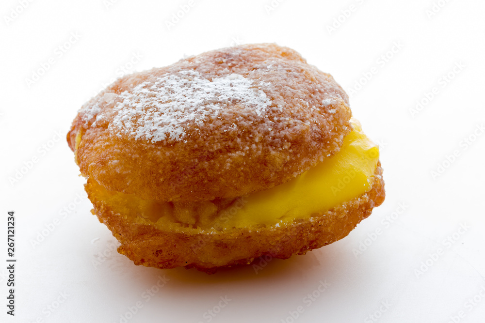 Handmade krapfen filled with pastry cream Handmade krapfen filled with pastry cream