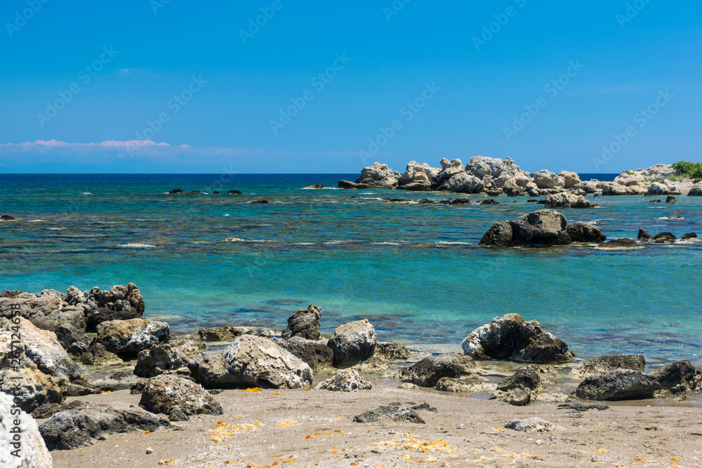 Seashore on the island of Rhodes in the Mediterranean sea in summer day.