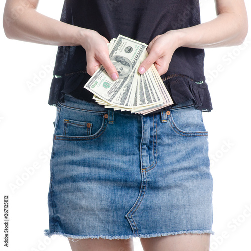 Woman holding in hand money dollars on white background. Isolation