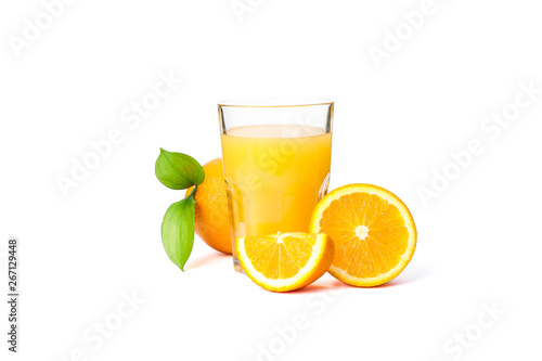 Glass of fresh orange juice with oranges and leaves isolated on white background. Fresh natural drink