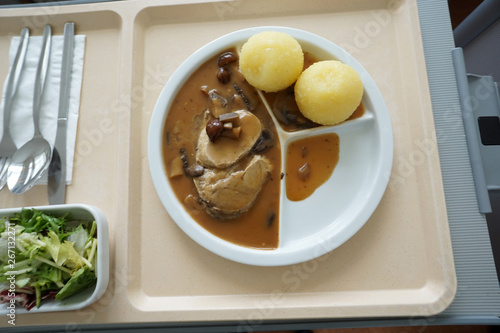 Hunter's roast with Klose and mushrooms in brown sauce served on the tray  photo