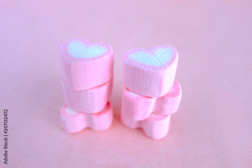 Set of heart marshmallow on pink background, Heart marshmallow arranged as layers. Sweet background Set of heart marshmallow on pink background, Heart marshmallow arranged as layers. Sweet background