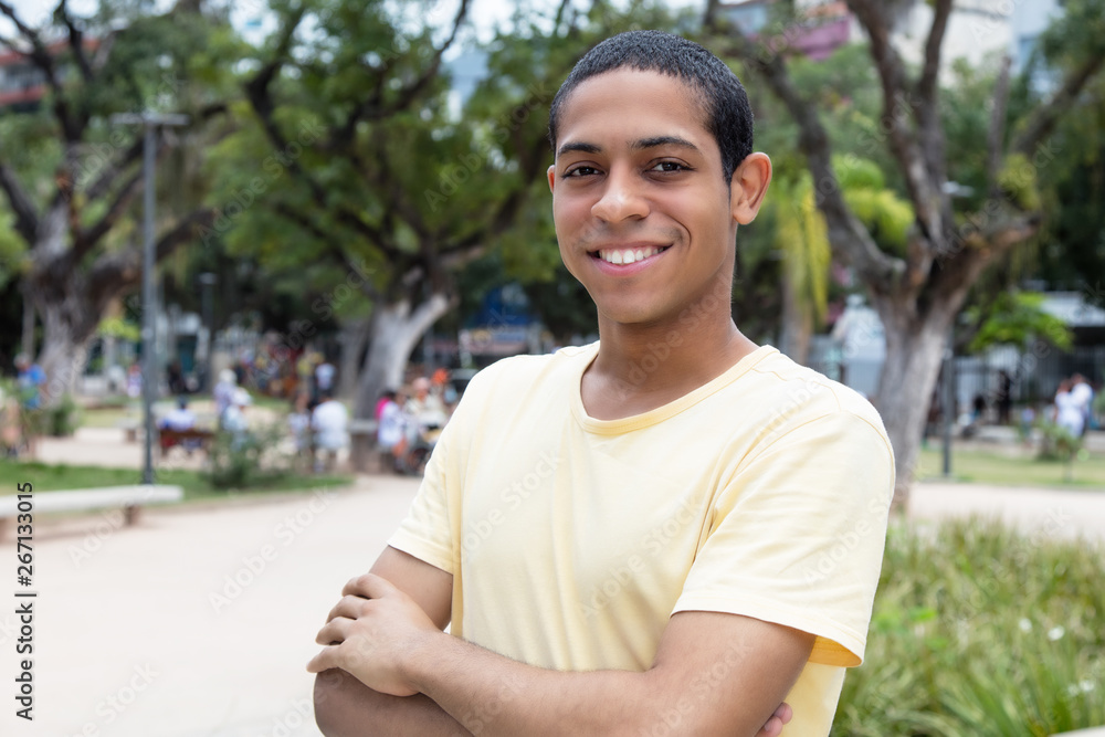 Fototapeta premium Standing egyptian young adult man with crossed arms