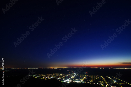 Aerial view of city lights during the night