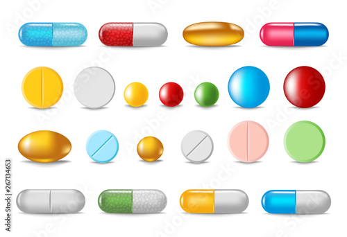 Set of color pills and capsules in realistic style photo