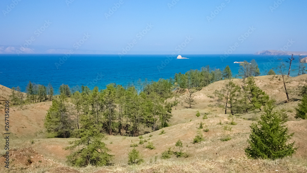 Sunny day. View of Lake Baikal from the shore. Landscape. Summer. Russia.