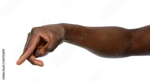 African-American man pointing at something on white background, closeup © New Africa