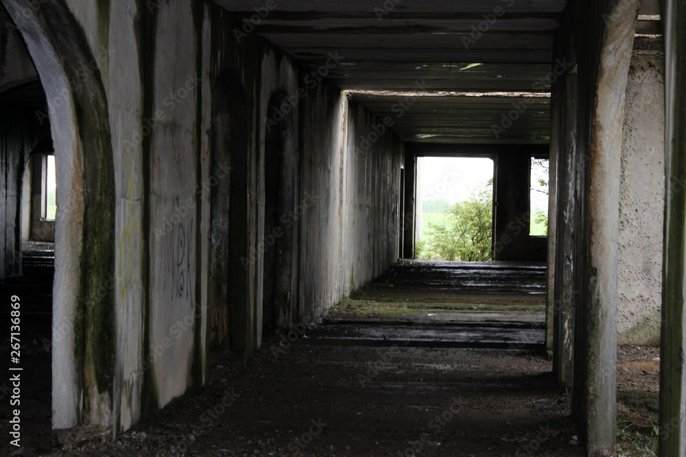 concrete walls of an old abandoned building concrete walls of an old abandoned building