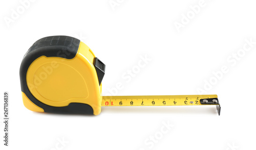 Metal measuring tape on white background. Construction tool photo