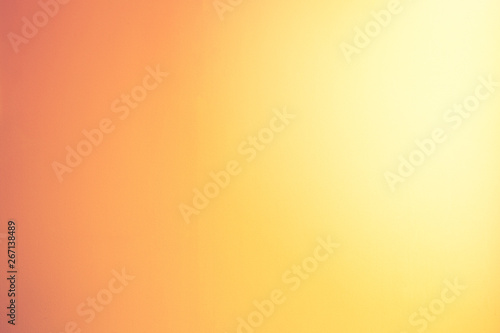Orange abstract gold background yellow color, light corner spotlight, faint orange vintage background. Colorful