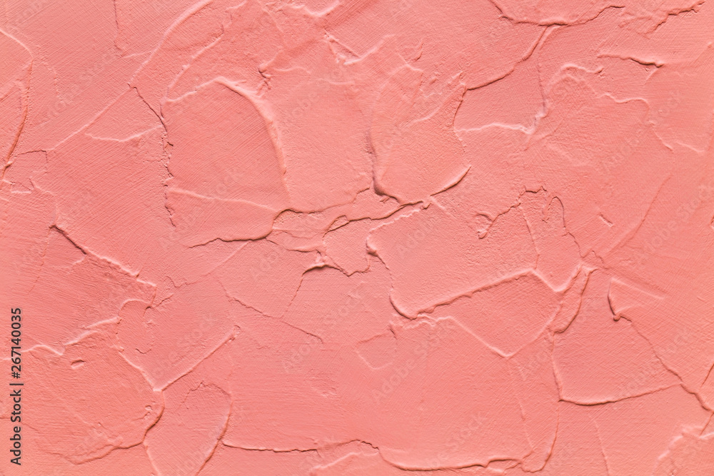 Fototapeta premium Coral red color, textured background, wavy plaster