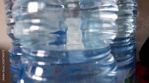 close up of plastic bottles full of water