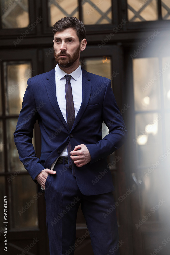 Modern businessman. Confident young man in full suit Modern businessman. Confident young man in full suit