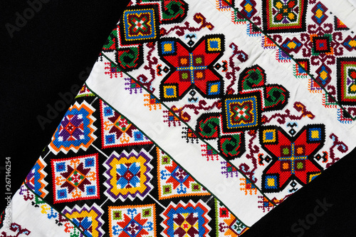 old Ukrainian embroidery in ornaments and patterns embroidered on a canvas photo