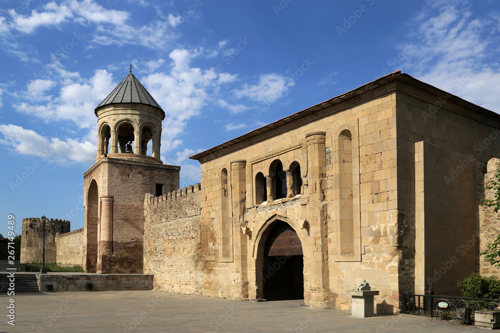 Belfry and the gate of the 11th century in the fortress wall surrounding Svetitskhoveli Cathedral.