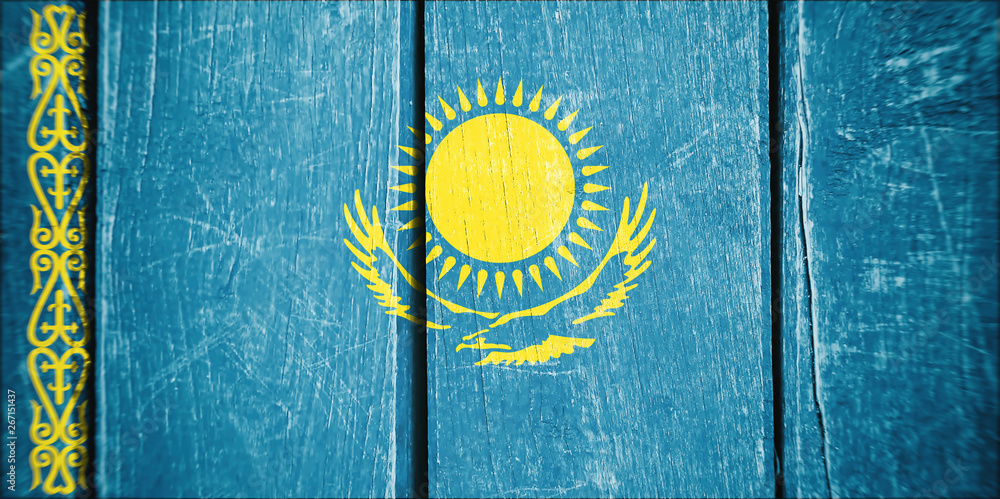 Flag of Kazakhstan, wooden background.