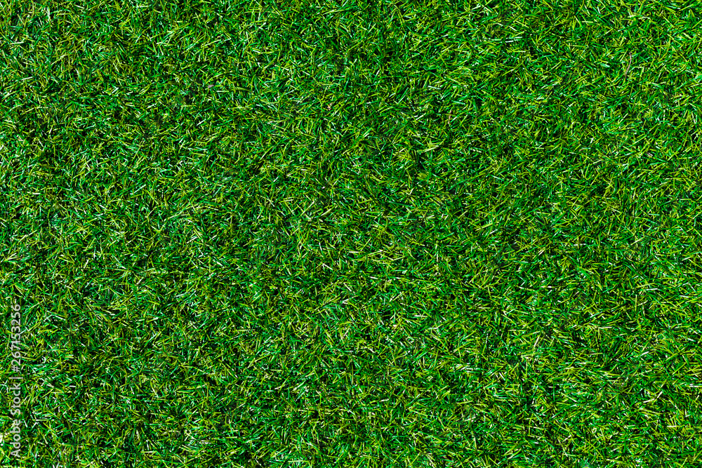 Fototapeta premium Top View Green Grass, Artificial Soccer Coverage, Field Or Lawn. Fake Grass Background For Playgrounds And Decoration.