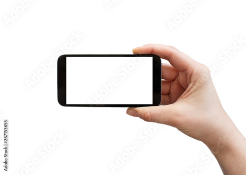 Female hand holding black cellphone with white screen at isolated background. 
