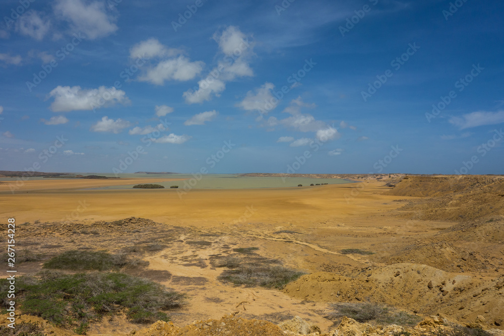 Yellow, brown desert and bay near Punta Gallinas in La Guajira, Colombia