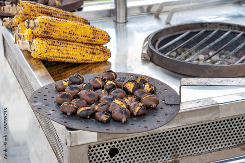 Fototapeta Naklejka Na Ścianę i Meble -  Grilled chestnut and corn on the street market in Athens