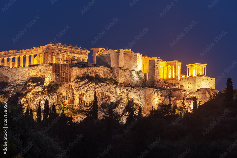 Parthenon on Acropolis Hill of Athens at night, historic heritage