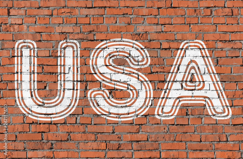 USA. Inscription on the seamless brickwall.