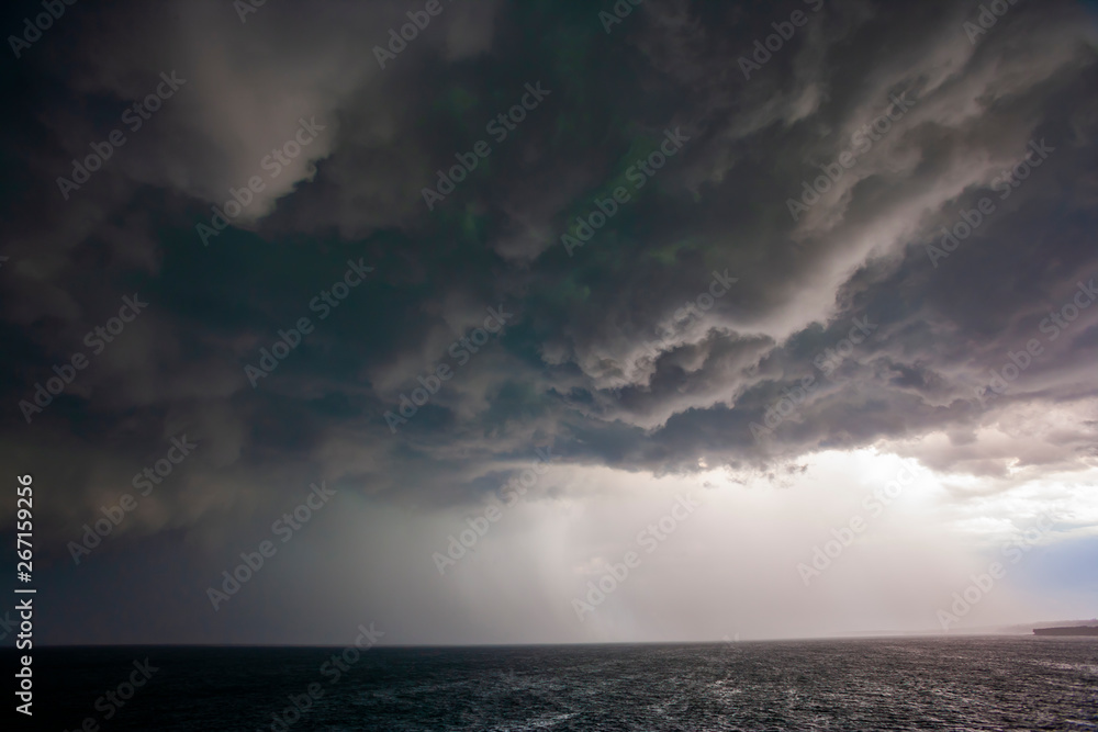 Dramatic Afternoon Storm over the Ocean 