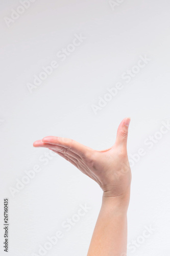 Wallpaper Mural A hand posturing like lift something not heavy to be higher for presentation. Torontodigital.ca