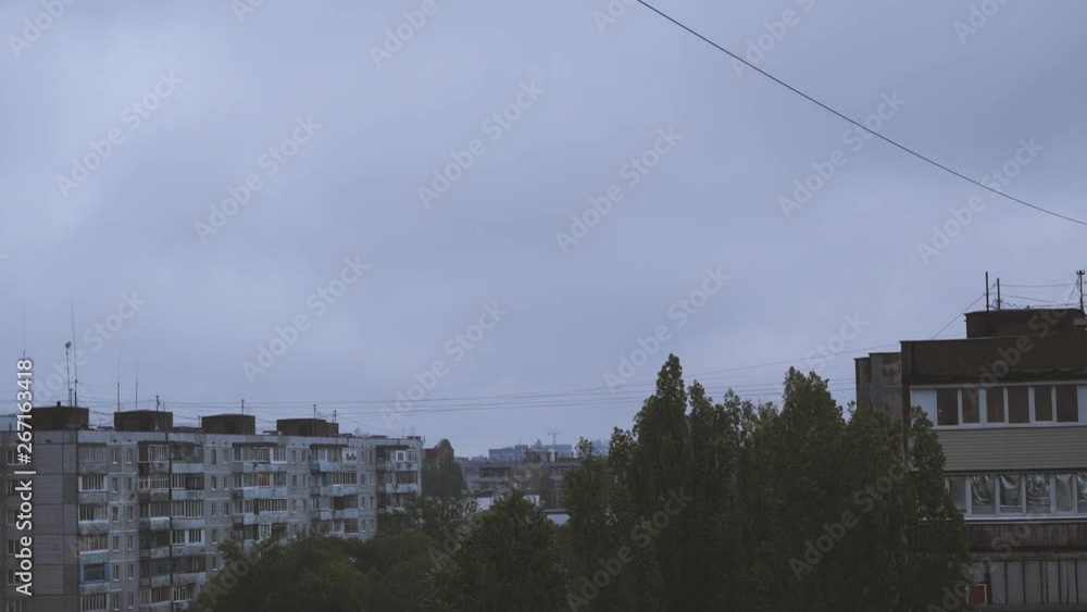 multi-storey building with dark clouds in bad weather multi-storey building with dark clouds in bad weather