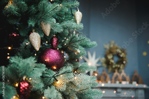 Christmas and New Year background. Place for text. Christmas and New Year Tree decorated close up.