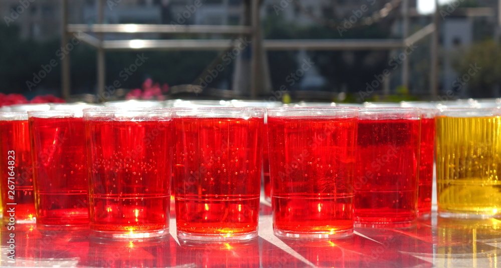 Glasses Filled with Red Liquid