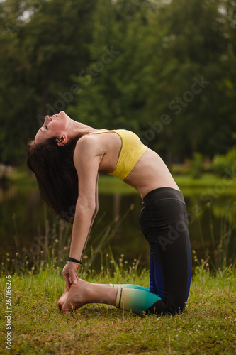 beautiful caucasian woman exercising yoga
