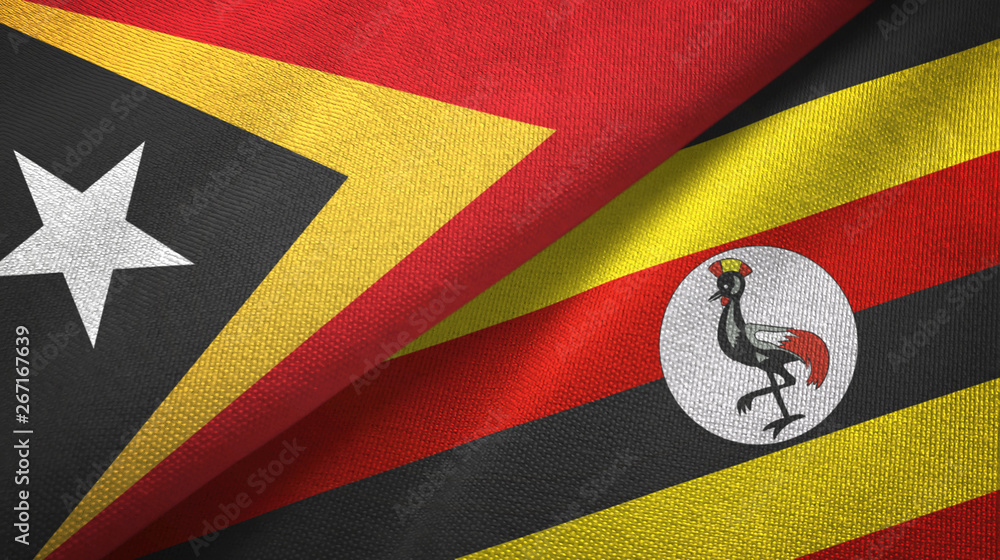 Fototapeta premium East Timor and Uganda two flags textile cloth, fabric texture