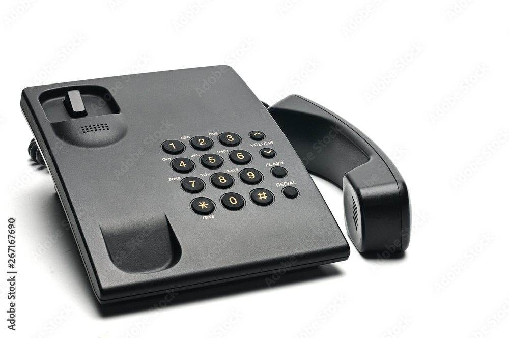 Classic wired telephone on a white background.Lifted handset phone Classic wired telephone on a white background.Lifted handset phone