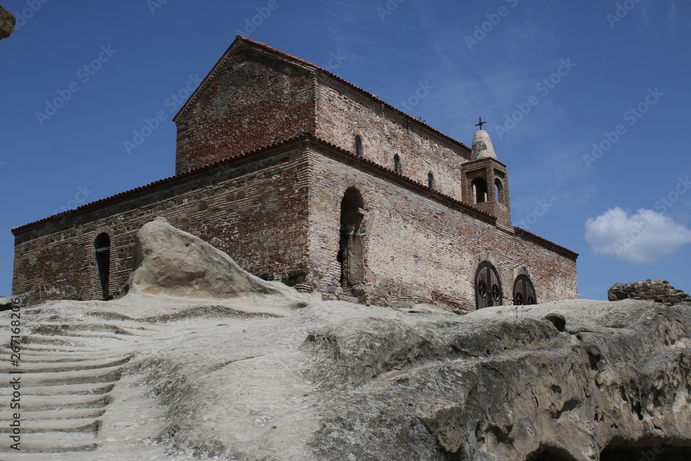 Fototapeta premium Early christian St.George's basilica (VI century) in the ancient rock-hewn town Uplistsikhe (Georgia)