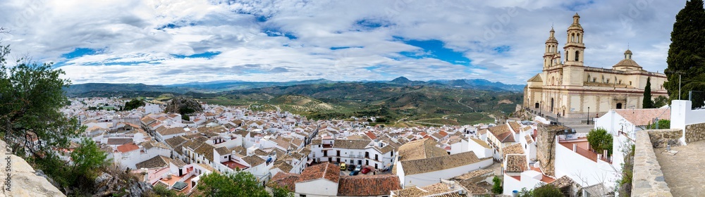 A panoramic view of the Spanish city of Olvera, including the church, from the base of the Moorish Tower.