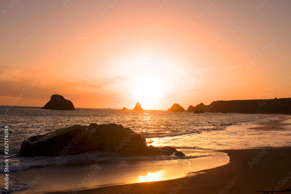 Magnificent sunset. Goat Rock Beach is located between Goat Rock Point and the Russian River along the Sonoma County shore near the town of Jenner. The Russian River, with its mouth at the north end 