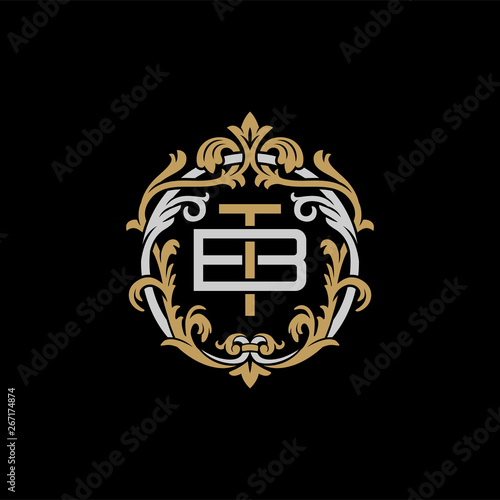 Initial letter B and T, BT, TB, decorative ornament emblem badge, overlapping monogram logo, elegant luxury silver gold color on black background
