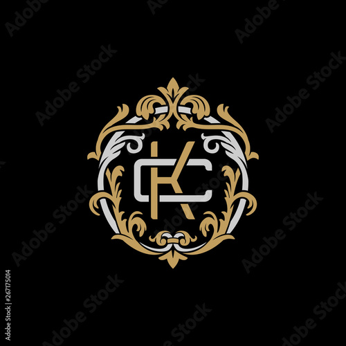 Fototapeta Naklejka Na Ścianę i Meble -  Initial letter C and K, CK, KC, decorative ornament emblem badge, overlapping monogram logo, elegant luxury silver gold color on black background