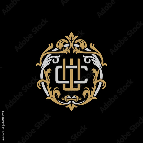 Initial letter C and W, CW, WC, decorative ornament emblem badge, overlapping monogram logo, elegant luxury silver gold color on black background