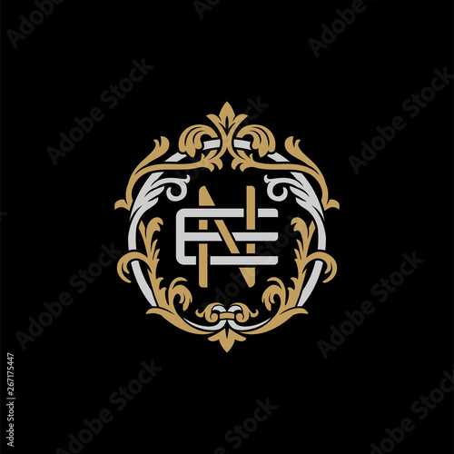 Fototapeta Naklejka Na Ścianę i Meble -  Initial letter E and N, EN, NE, decorative ornament emblem badge, overlapping monogram logo, elegant luxury silver gold color on black background